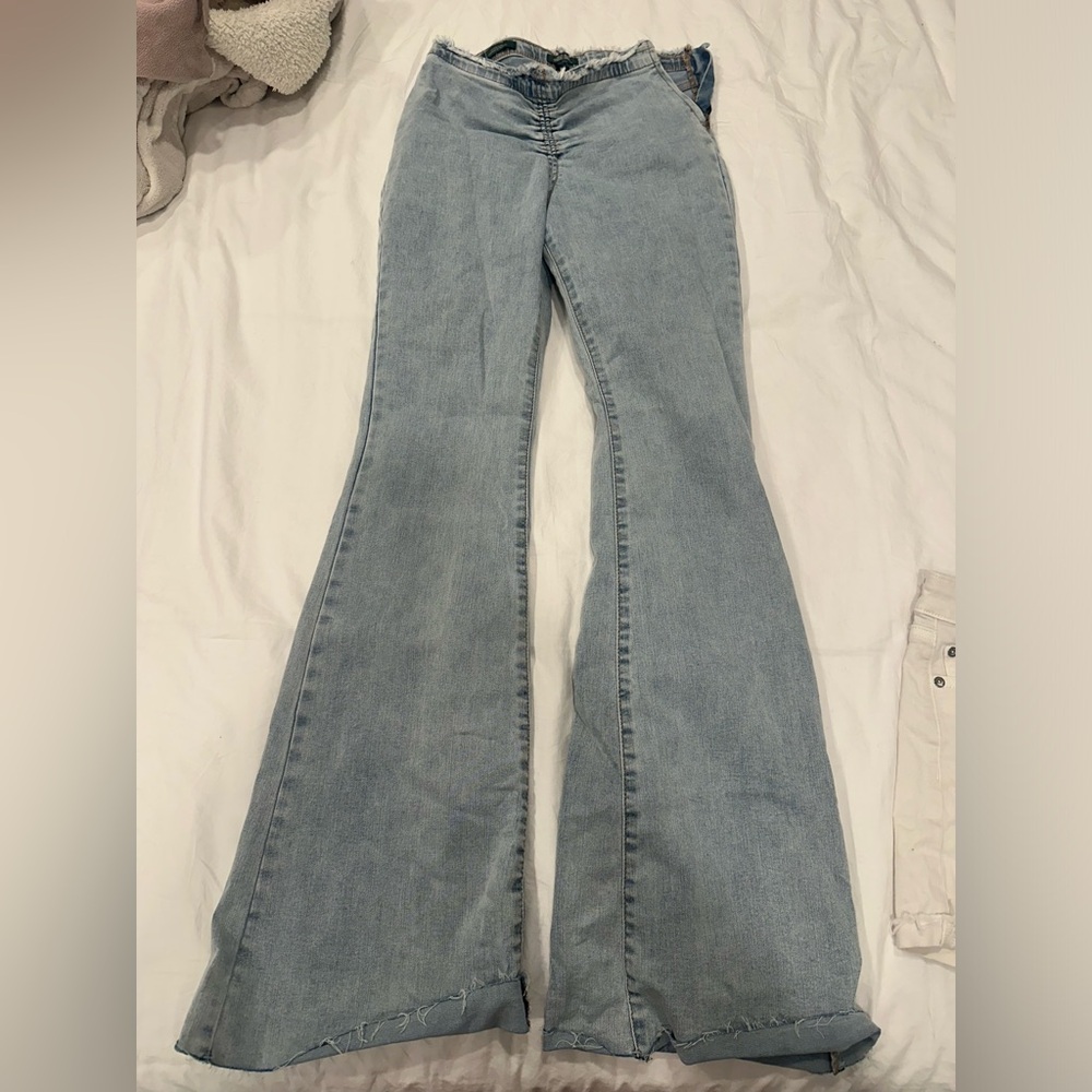 target wild fable mid/high rise flare blue jeans light wash with zipper on side